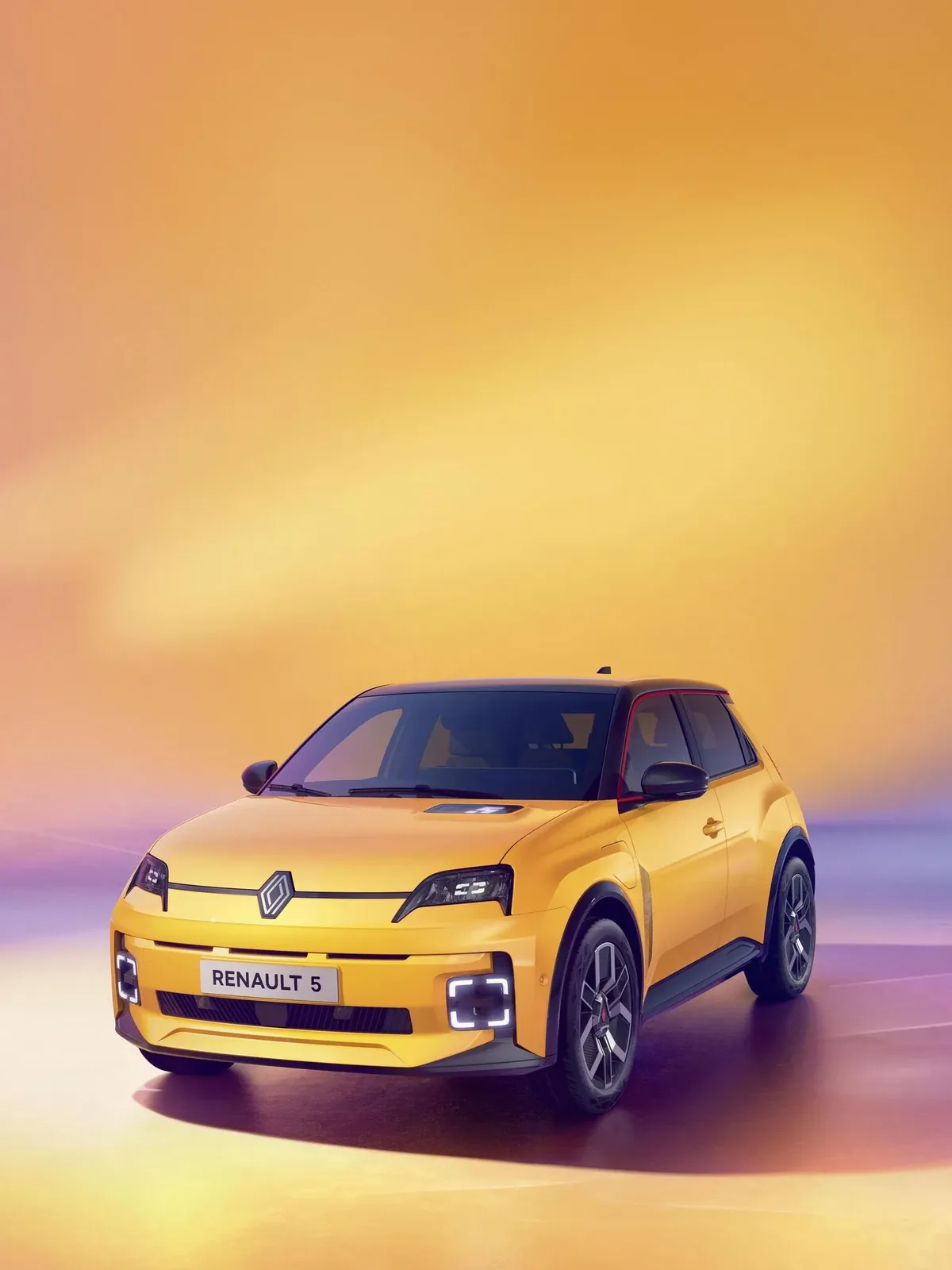 Renault 5 E-Tech jaune, trois quarts avant